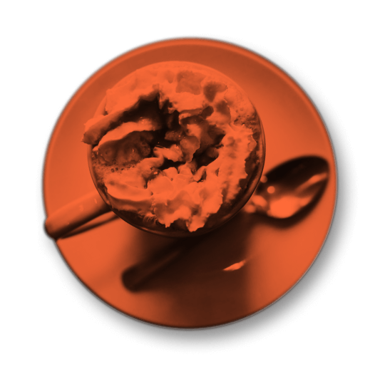 Image of coffe mug topped with whipped cream